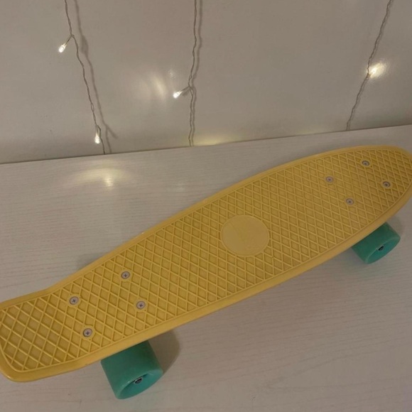 Other - PENNY BOARD yellow with blue wheels 22”